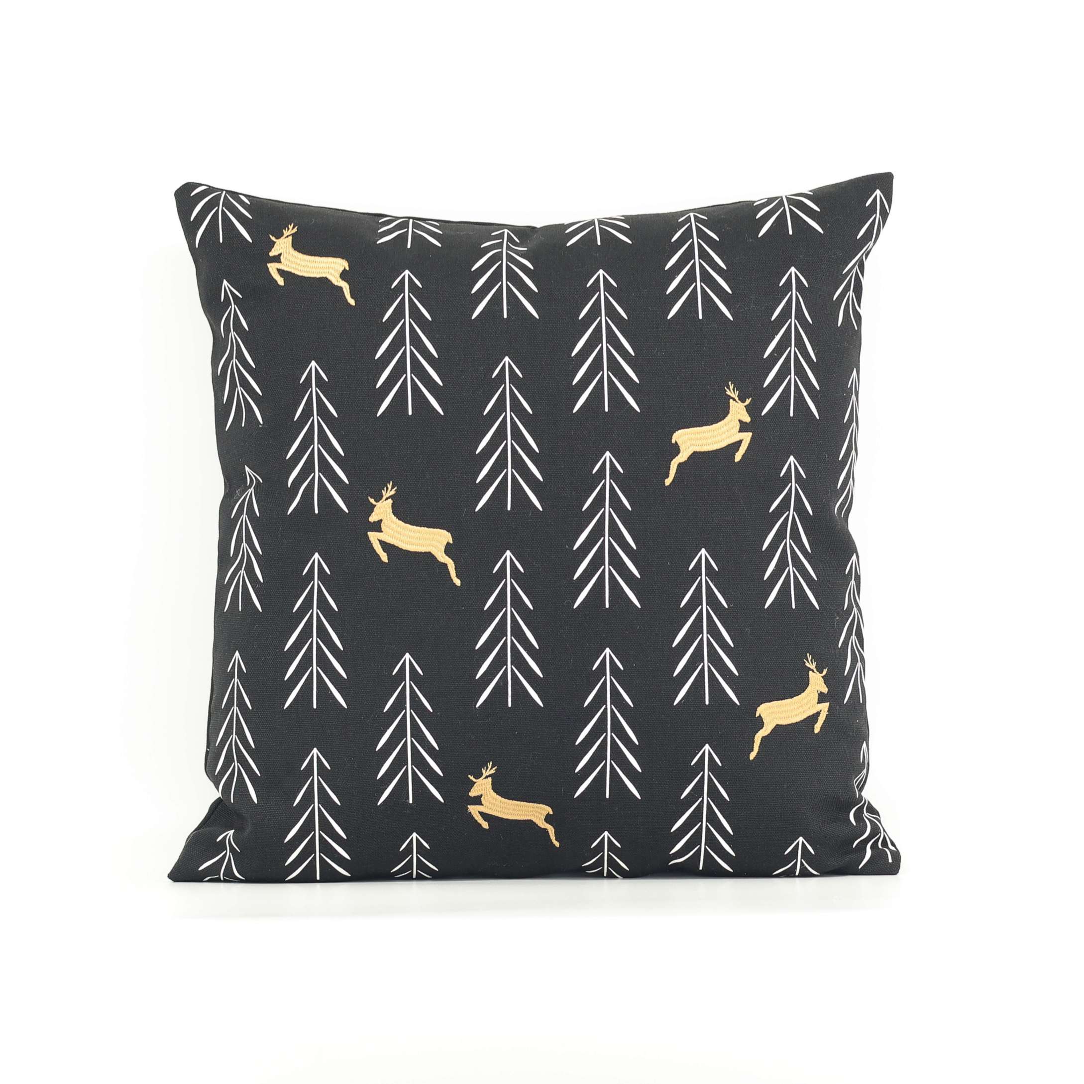 Decorative pillow with deer and tree pattern on a black background
